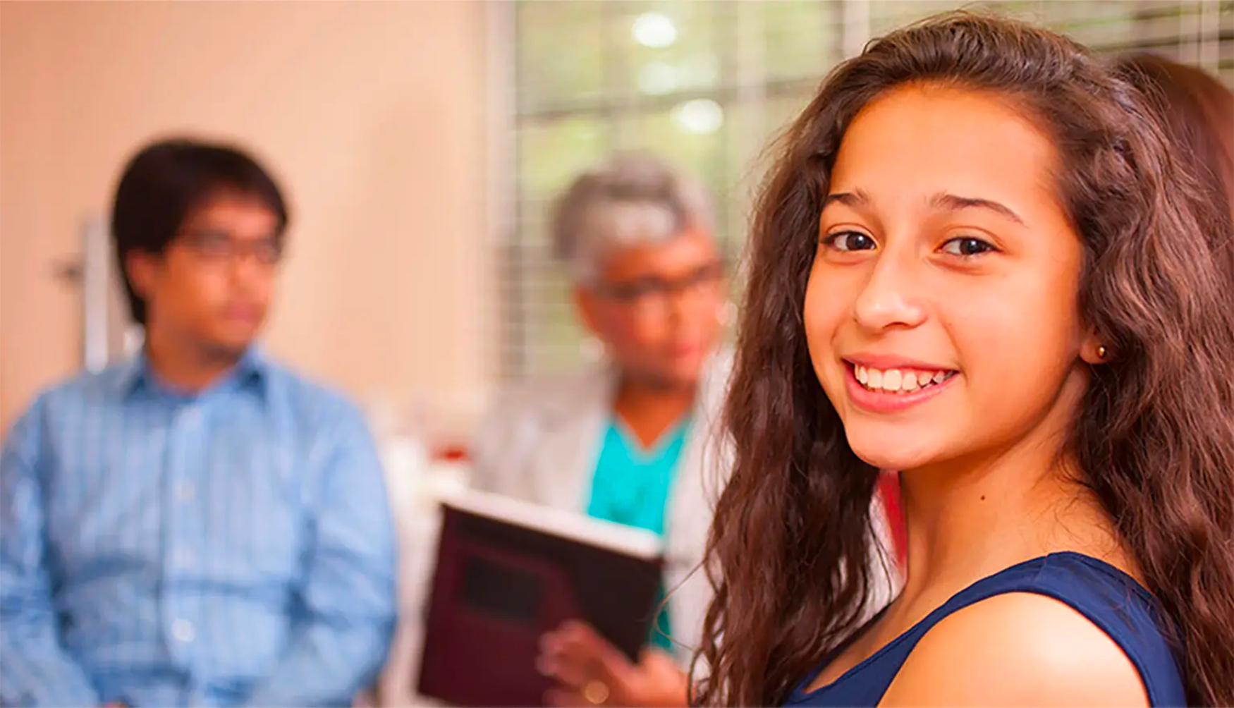 Image of a teenage girl smiling